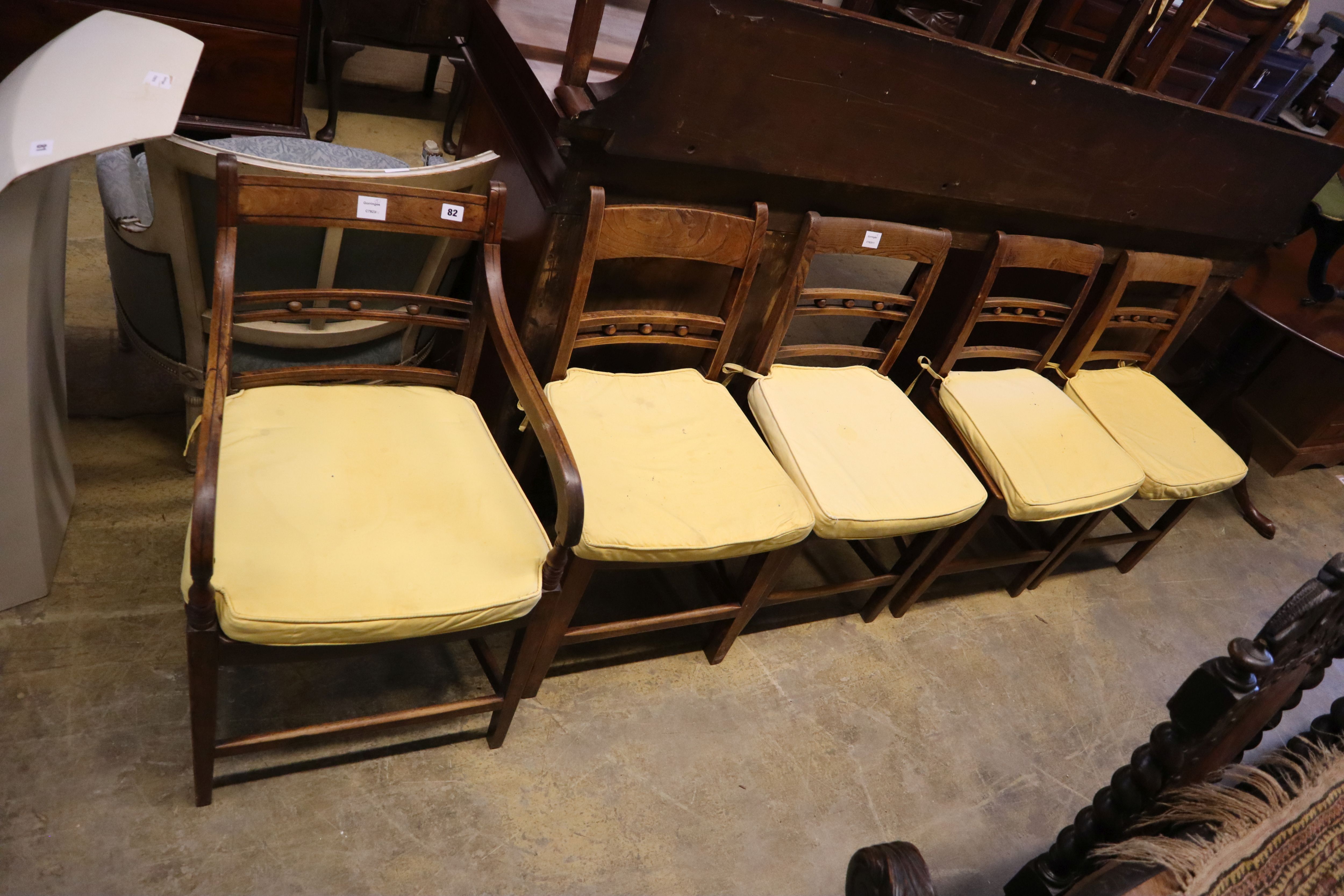 A harlequin set of 8 Regency elm and fruitwood dining chairs and a Regency elbow chair